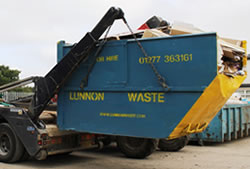 Skip Hire Loughton unloading a full skip