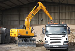 Skip Hire Loughton unloading a lorry