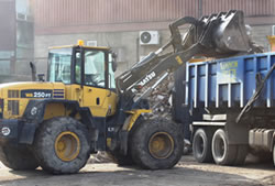 Skip Hire Loughton loading a lorry